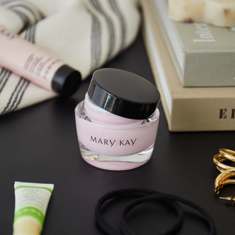 Mary Kay Intense Moisturizing Cream with other products on a desk